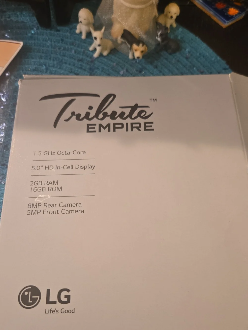 LG Tribute Empire White Retail Box With LG CELL PHONE